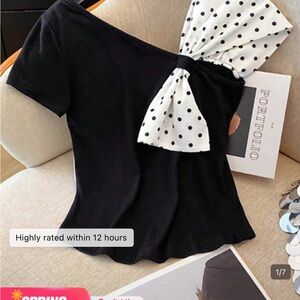 Elegant Black Top with Polka Dot Bow